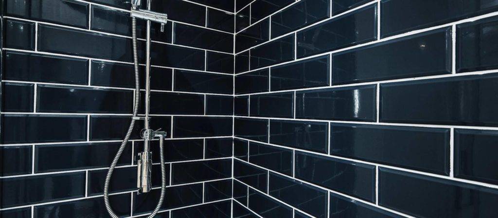 black tiled modern shower