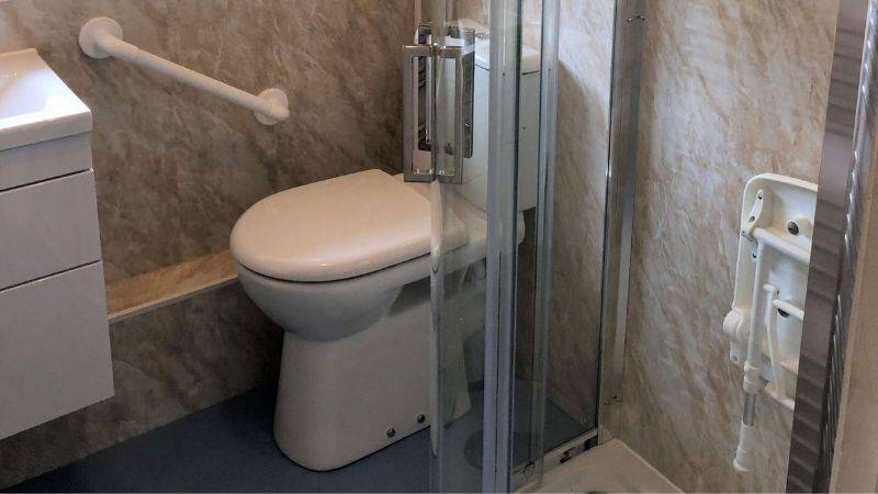 shower-foldable seat-assisted shower fitters