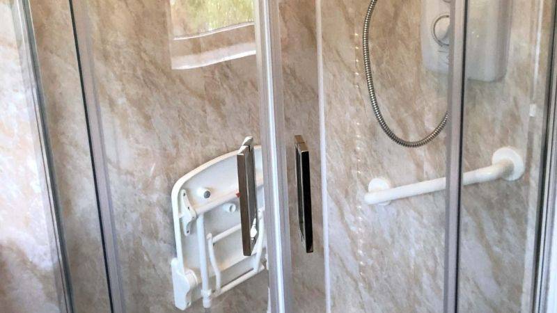 sit in shower - foldable seat - assisted handles